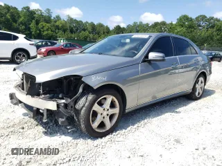 2014 Mercedes-Benz E 350 Luxury with VIN WDDHF8JB0EA901666, listed as a Copart auction lot 62863815 with 154,556 mi miles and Salvage title. Bid and sale history available at DreamBid. Image 1.