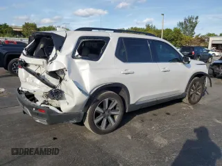 2024 Honda Pilot Touring с VIN 5FNYG2H76RB008887, выставлен на аукционе Copart как лот 46479745 с пробегом 12 947 миль миль и Списание • Salvage title. История ставок и продаж доступна на DreamBid. Изображение 3.