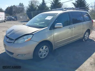 2010 Toyota Sienna XLE with VIN 5TDYK4CC0AS302669, listed as a IAAI auction lot 41886357 with 200,039 mi miles. Bid and sale history available at carsss.com. Image 17.