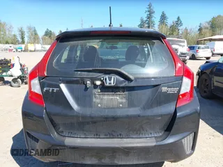 2015 Honda Fit LX with VIN 3HGGK5H58FM765907, listed as a IAAI auction lot 42061158 with 120,178 mi miles. Bid and sale history available at carsss.com. Image 17.