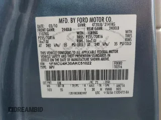 2010 Ford Escape Hybrid with VIN 1FMCU4K30AKC51022, listed as a Copart auction lot 51014615 with 128,275 mi miles and Salvage title. Bid and sale history available at DreamBid. Image 16.