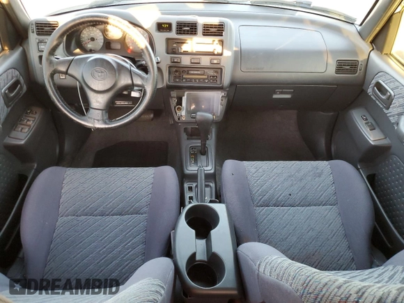 1999 Toyota RAV4 with VIN JT3GP10VXX7053225, listed as a Copart auction lot 87920975 with 228,943 mi miles and Salvage Title. Bid and sale history available at DreamBid. Image 8.