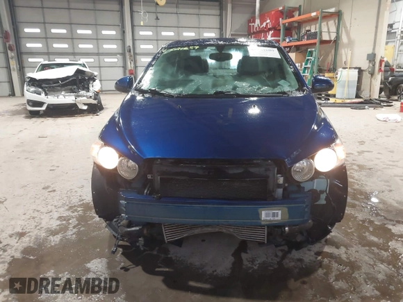2014 Chevrolet Sonic LTZ with VIN 1G1JE5SB5E4226187, listed as a IAAI auction lot 41521689 with 73,325 mi miles. Bid and sale history available at carsss.com. Image 6.