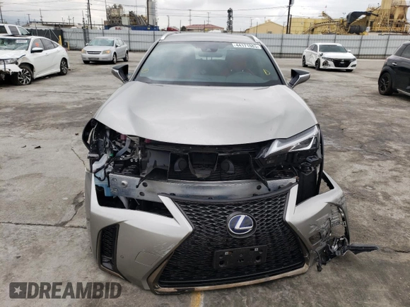 2021 Lexus UX with VIN JTHE9JBH2M2051660, listed as a Copart auction lot 44171883 with 13,471 mi miles. Bid and sale history available at carsss.com. Image 5.