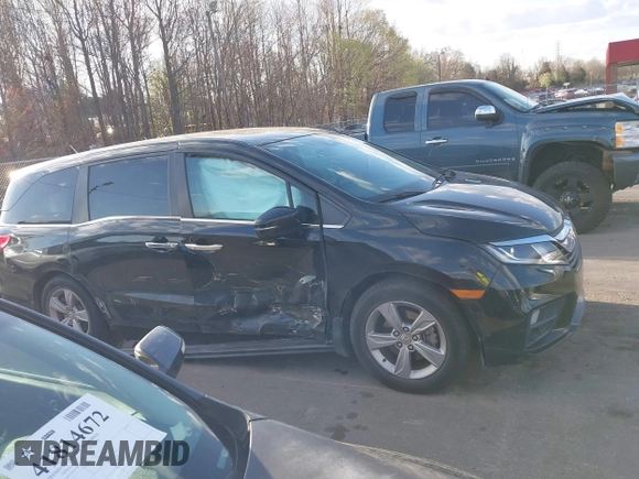 2019 Honda Odyssey EX-L with VIN 5FNRL6H74KB061567, listed as a IAAI auction lot 41810919 with 129,146 mi miles. Bid and sale history available at carsss.com. Image 13.