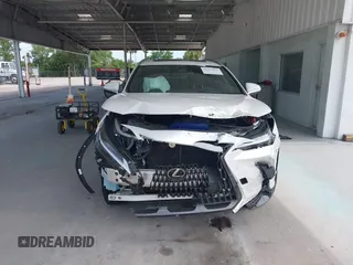 2023 Lexus NX 350h Premium z VIN 2T2GKCEZ2PC010333, wystawiony jako IAAI lot #42641664 z przebiegiem 35 369 mil mil oraz . Historia ofert i sprzedaży dostępna na DreamBid. Obrazek 13.