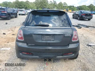 2012 MINI Hardtop S with VIN WMWSV3C50CTY18637, listed as a Copart auction lot 57771015 with 103,402 mi miles and Salvage title. Bid and sale history available at DreamBid. Image 6.