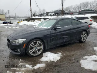 2014 BMW 4 Series 435i with VIN WBA3R1C51EK192909, listed as a Copart auction lot 44700155 with 104,506 mi miles and Salvage Title. Bid and sale history available at carsss.com. Image 1.