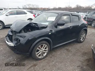 2014 Nissan Juke S with VIN JN8AF5MR1ET351423, listed as a IAAI auction lot 41581183 with 100,528 mi miles. Bid and sale history available at carsss.com. Image 2.