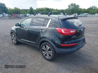 2013 Kia Sportage EX with VIN KNDPCCA23D7427564, listed as a IAAI auction lot 42681328 with 111,963 mi miles and . Bid and sale history available at DreamBid. Image 3.