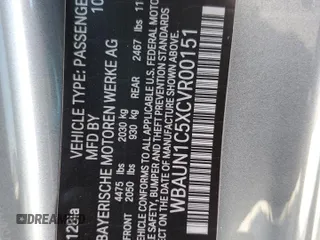 2012 BMW 1 Series 128i with VIN WBAUN1C5XCVR00151, listed as a Copart auction lot 56040445 with 171,302 mi miles and Salvage title. Bid and sale history available at DreamBid. Image 12.