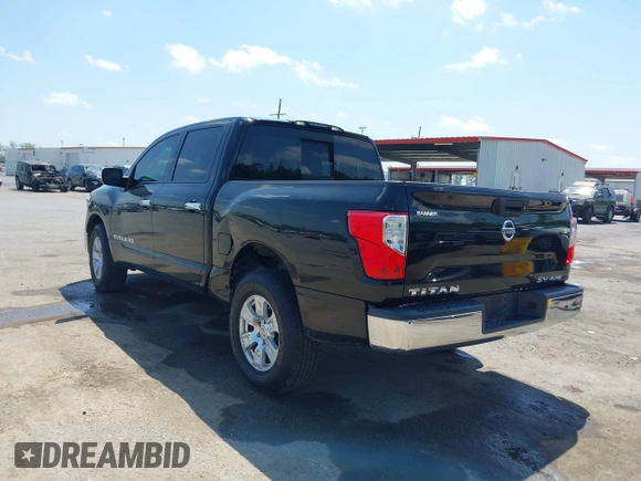 2018 Nissan Titan SV with VIN 1N6AA1EJ4JN529655, listed as a IAAI auction lot 42051405 with 153,599 mi miles and . Bid and sale history available at DreamBid. Image 3.