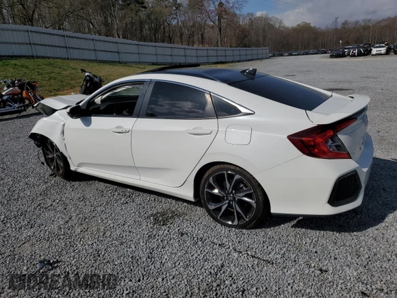 2018 Honda Civic Si with VIN 2HGFC1E50JH700689, listed as a Copart auction lot 50030115 with 127,041 mi miles and Salvage Title. Bid and sale history available at DreamBid. Image 2.