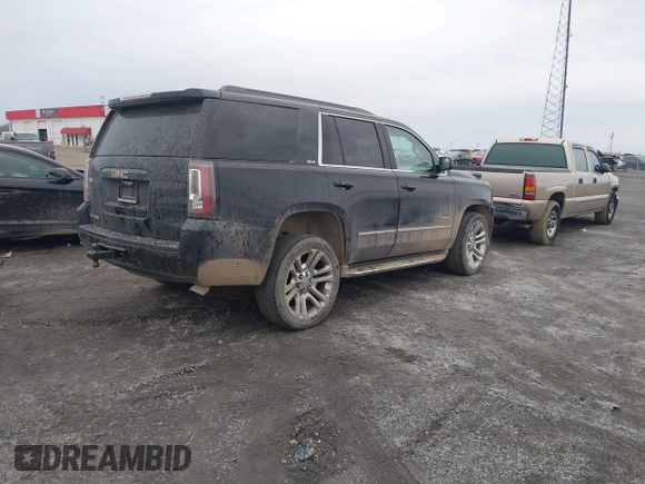 2016 GMC Yukon SLT with VIN 1GKS1BKC9GR480199, listed as a IAAI auction lot 41352032 with 146,716 mi miles. Bid and sale history available at carsss.com. Image 4.