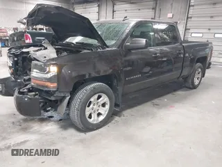 2016 Chevrolet Silverado 1500 LT with VIN 3GCUKRECXGG216804, listed as a IAAI auction lot 41825811 with 127,217 mi miles and . Bid and sale history available at DreamBid. Image 2.