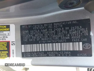2019 Toyota Camry LE z VIN 4T1B11HK7KU756675, wystawiony jako IAAI lot #42063923 z przebiegiem 132 312 mil mil oraz . Historia ofert i sprzedaży dostępna na DreamBid. Obrazek 9.
