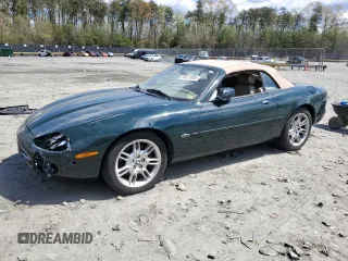 2002 Jaguar XK with VIN SAJDA42C22NA23724, listed as a Copart auction lot 53521005 with 61,468 mi miles and Salvage Title. Bid and sale history available at DreamBid. Image 1.
