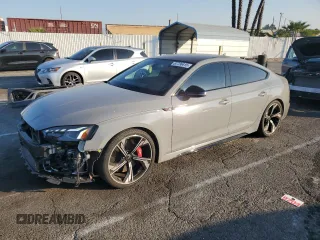 2023 Audi RS 5 Sportback z VIN WUAAWCF55PA902786, wystawiony jako Copart lot #87736415 z przebiegiem 11 557 mil mil oraz Szkoda całkowita • Salvage title. Historia ofert i sprzedaży dostępna na DreamBid. Obrazek 1.