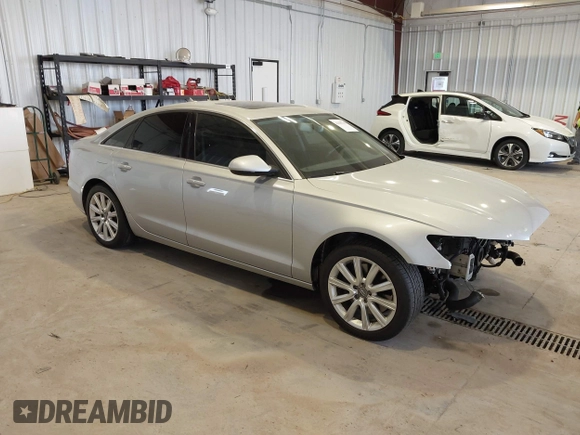 2015 Audi A6 Premium z VIN WAUFFAFC3FN021983, wystawiony jako IAAI lot #42105719 z przebiegiem 104 143 mil mil oraz . Historia ofert i sprzedaży dostępna na DreamBid. Obrazek 1.