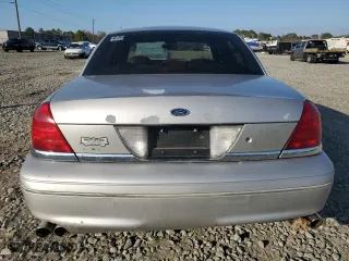 2004 Ford Crown Victoria LX with VIN 2FDFP74W74X150801, listed as a Copart auction lot 43869115 with 138,243 mi miles and Salvage Title. Bid and sale history available at carsss.com. Image 6.