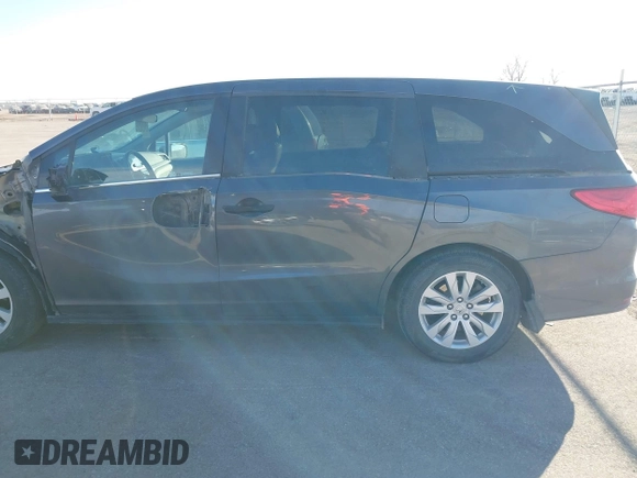 2019 Honda Odyssey LX with VIN 5FNRL6H21KB057139, listed as a IAAI auction lot 41422185 with 128,812 mi miles and . Bid and sale history available at DreamBid. Image 14.