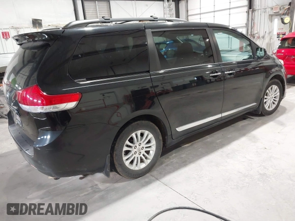 2012 Toyota Sienna XLE AAS with VIN 5TDYK3DC1CS234894, listed as a IAAI auction lot 41201751 with 108,464 mi miles and . Bid and sale history available at DreamBid. Image 4.