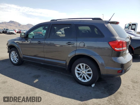 2017 Dodge Journey SXT with VIN 3C4PDCBB5HT701487, listed as a Copart auction lot 58821045 with 118,585 mi miles and Salvage title. Bid and sale history available at DreamBid. Image 2.