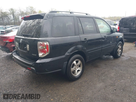 2006 Honda Pilot EX-L with VIN 5FNYF18776B021690, listed as a IAAI auction lot 42016219 with 239,666 mi miles and . Bid and sale history available at DreamBid. Image 4.