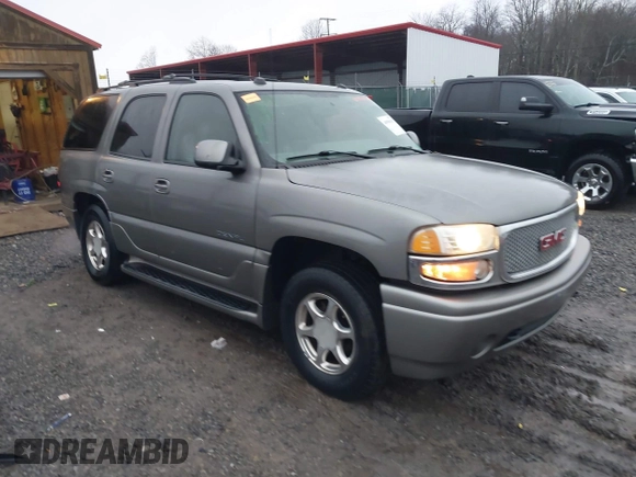 2005 GMC Yukon Denali z VIN 1GKEK63U25J228296, wystawiony jako IAAI lot #40980307 z przebiegiem 192 353 mil mil oraz . Historia ofert i sprzedaży dostępna na DreamBid. Obrazek 1.