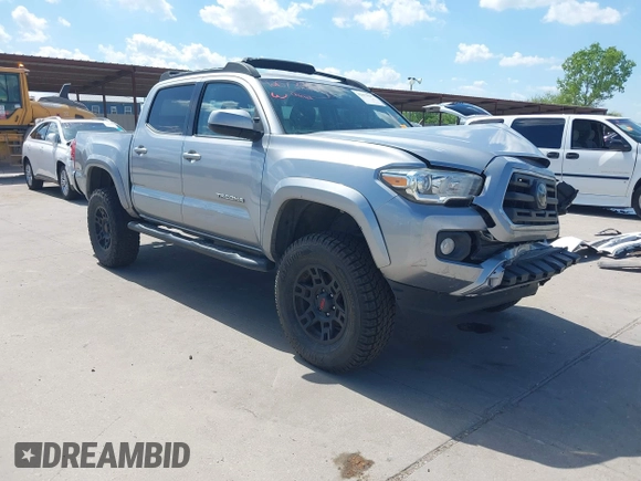 2018 Toyota Tacoma SR with VIN 3TMCZ5AN2JM172829, listed as a IAAI auction lot 42073847 with 136,671 mi miles and . Bid and sale history available at carsss.com. Image 1.