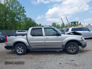 2005 Ford Explorer Sport Trac XLS z VIN 1FMZU77K55UB51889, wystawiony jako IAAI lot #42279164 z przebiegiem 210 081 mil mil oraz . Historia ofert i sprzedaży dostępna na DreamBid. Obrazek 13.