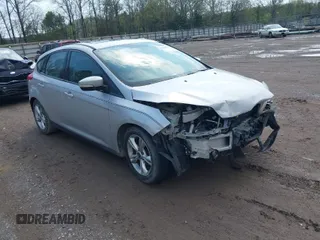 2014 Ford Focus SE z VIN 1FADP3K22EL313141, wystawiony jako IAAI lot #42003707 z przebiegiem 156 182 mil mil oraz . Historia ofert i sprzedaży dostępna na DreamBid. Obrazek 1.