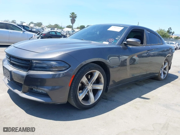 2016 Dodge Charger R/T with VIN 2C3CDXCT7GH233027, listed as a IAAI auction lot 37009912 with 132,960 mi miles. Bid and sale history available at carsss.com. Image 2.