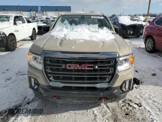 2021 GMC Canyon 4WD AT4 z VIN 1GTG6FEN8M1157828, wystawiony jako Copart lot #88392435 z przebiegiem 45 252 mil mil oraz Szkody całkowita. Historia ofert i sprzedaży dostępna na DreamBid. Obrazek 5.