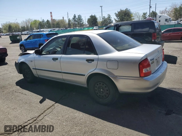 2003 Mazda Protege DX with VIN JM1BJ225730217866, listed as a Copart auction lot 53854075 with 105,782 mi miles and Salvage Title. Bid and sale history available at DreamBid. Image 2.