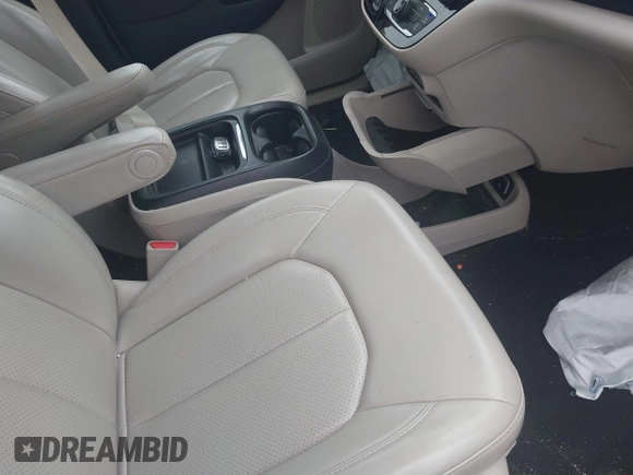 2021 Chrysler Voyager LXi with VIN 2C4RC1DG6MR545823, listed as a IAAI auction lot 41581582 with 79,329 mi miles and . Bid and sale history available at DreamBid. Image 5.