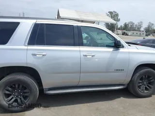 2018 Chevrolet Tahoe LT with VIN 1GNSCBKC1JR148374, listed as a IAAI auction lot 42247479 with 90,550 mi miles and . Bid and sale history available at DreamBid. Image 14.