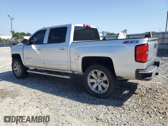 2018 Chevrolet Silverado 1500 LT with VIN 3GCUKREC6JG167804, listed as a Copart auction lot 52859235 with 124,822 mi miles and Salvage Title. Bid and sale history available at DreamBid. Image 2.