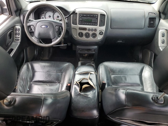 2004 Ford Escape Limited with VIN 1FMCU04134KA61949, listed as a Copart auction lot 47377455 with 205,480 mi miles and Salvage title. Bid and sale history available at DreamBid. Image 8.