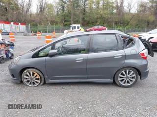 2013 Honda Fit Sport with VIN JHMGE8H56DC029276, listed as a IAAI auction lot 42002632 with 199,549 mi miles. Bid and sale history available at carsss.com. Image 14.