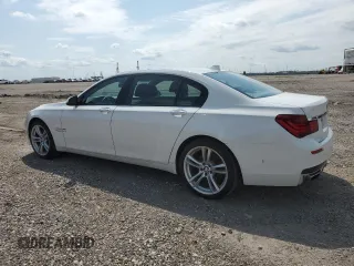 2014 BMW 7 Series 740Li with VIN WBAYE4C59ED137938, listed as a Copart auction lot 55281005 with 146,659 mi miles and Salvage Title. Bid and sale history available at carsss.com. Image 2.