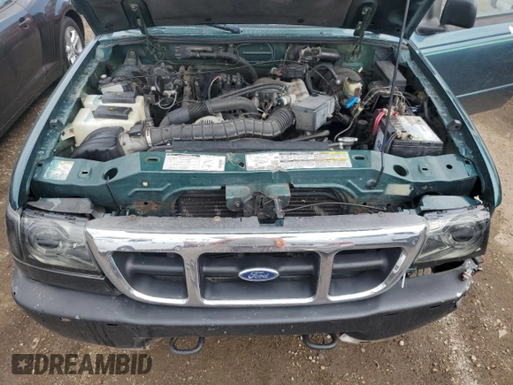 2000 Ford Ranger XL with VIN 1FTZR15VXYPB87516, listed as a Copart auction lot 52945795 with 165,652 mi miles and Salvage title. Bid and sale history available at DreamBid. Image 11.