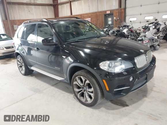 2012 BMW X5 50i with VIN 5UXZV8C50CL425721, listed as a IAAI auction lot 42590676 with 192,355 mi miles and . Bid and sale history available at DreamBid. Image 1.