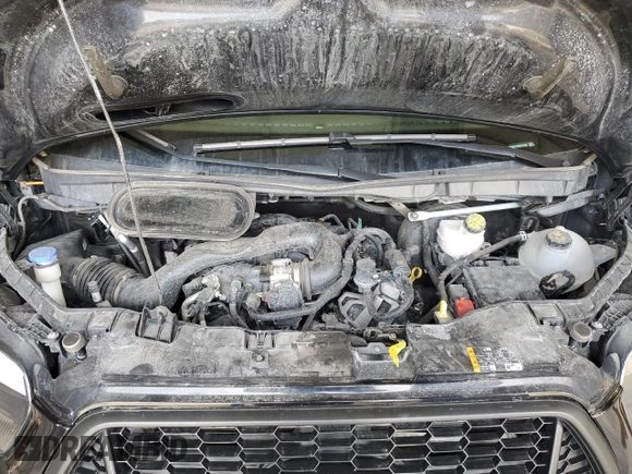 2021 Ford Transit Cargo with VIN 1FTBR1C82MKA77940, listed as a Copart auction lot 49711275 with 34,989 mi miles and Salvage Title. Bid and sale history available at DreamBid. Image 12.