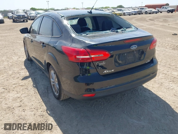 2016 Ford Focus SE with VIN 1FADP3F28GL349817, listed as a IAAI auction lot 42016215 with 68,816 mi miles and . Bid and sale history available at DreamBid. Image 3.