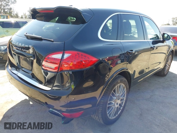 2012 Porsche Cayenne S Hybrid with VIN WP1AE2A23CLA93096, listed as a IAAI auction lot 41972843 with 79,139 mi miles. Bid and sale history available at carsss.com. Image 4.