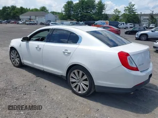 2013 Lincoln MKS EcoBoost with VIN 1LNHL9FT0DG606567, listed as a IAAI auction lot 42561162 with 285,830 mi miles and . Bid and sale history available at DreamBid. Image 3.