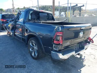 2019 Ram 1500 Limited with VIN 1C6SRFHT8KN839939, listed as a IAAI auction lot 42225074 with Not provided miles and . Bid and sale history available at DreamBid. Image 3.