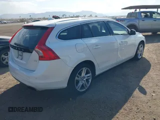 2015 Volvo V60 T5 Drive-E Platinum with VIN YV126MED5F1189283, listed as a IAAI auction lot 41422739 with 112,043 mi miles. Bid and sale history available at carsss.com. Image 4.