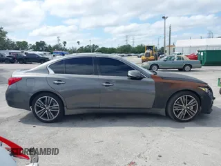 2015 Infiniti Q50 Premium with VIN JN1BV7AP8FM352195, listed as a IAAI auction lot 41968813 with 146,542 mi miles. Bid and sale history available at carsss.com. Image 13.